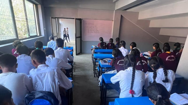School is held in morning and afternoon shifts and classes are conducted inside stairwells of a sports academy located on higher ground away from the river. Photo: Rajendra Dawadi