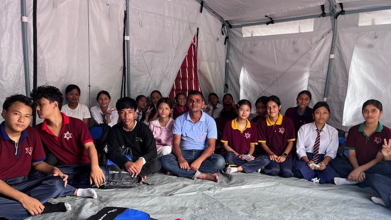 Pupils remember the computer and science laboratories in their old school washed away in the floods but are grateful that classes have begun in a temporary facility. Photo: Rajendra Dawadi