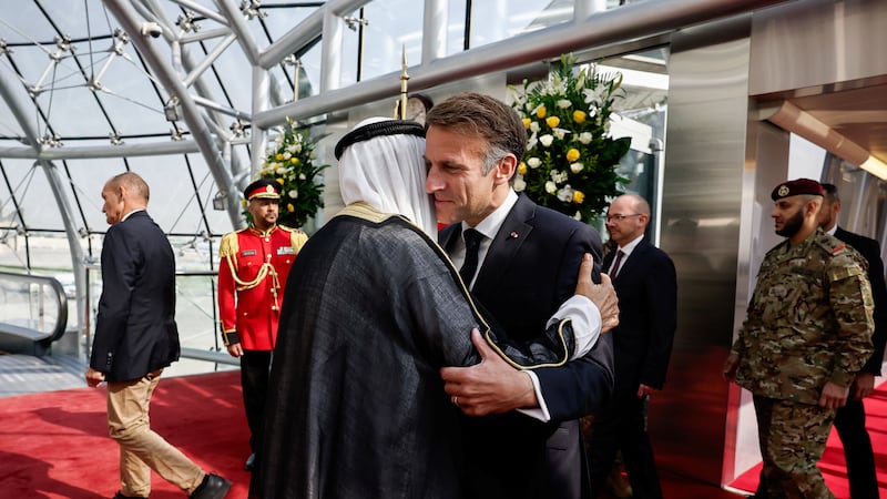The leaders meet in Kuwait, as Mr Macron tours the Gulf. Reuters