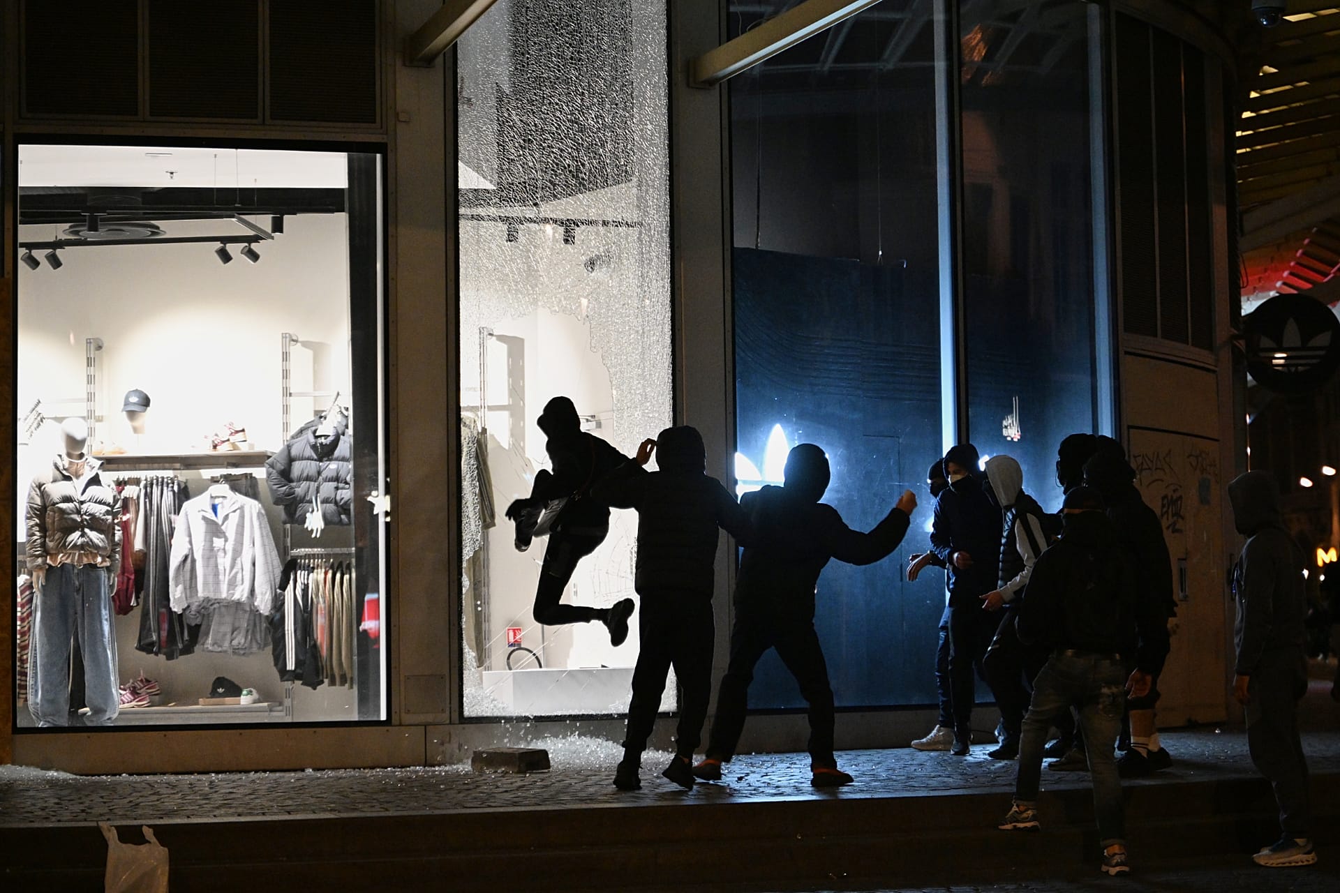 Stores across Paris had windows smashed and products stolen by gangs of youths in hoodies. 18 October, 2026.