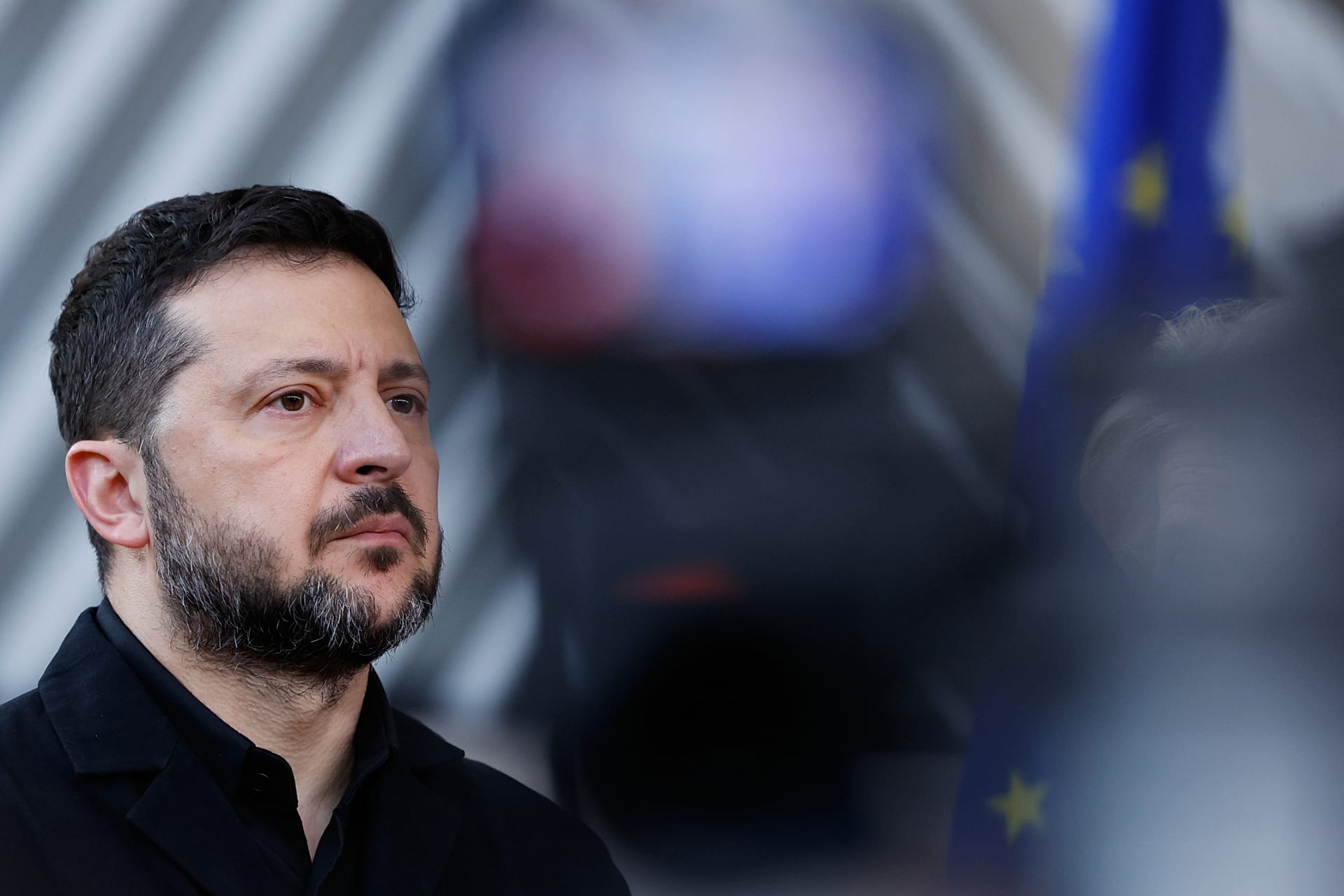 Ukraine's President Volodymyr Zelenskyy speaks with the media as he arrives for the EU summit in Brussels, 16 October, 2026