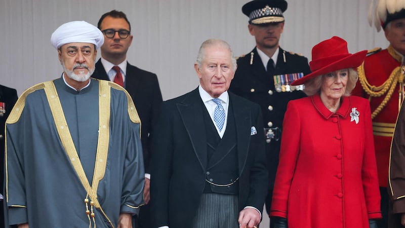Sultan Haitham of Oman, Britain's King Charles III and Queen Camilla stand at The Royal Dias in Windsor, during the Sultan's state visit. AFP