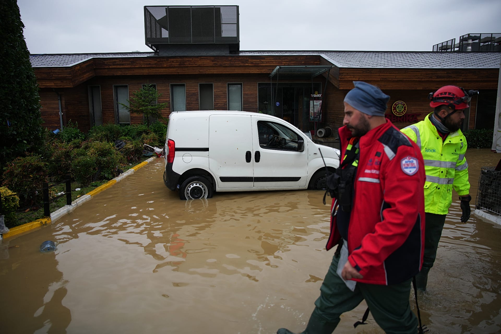Emergency team members work in the aftermath of floods caused by heavy rains in Istanbul, 15 October, 2026