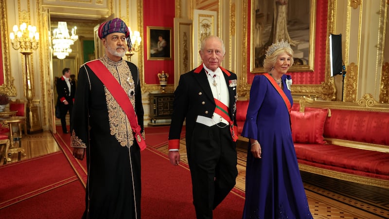 Sultan Haitham, King Charles and Queen Camilla arrive for a state banquet at Windsor Castle. Getty Images