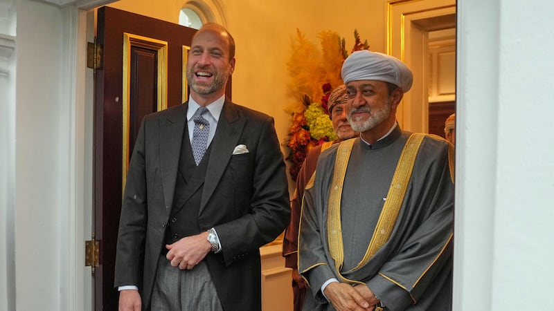 Prince William and Sultan Haitham leave the Sultan's residence in London. AFP