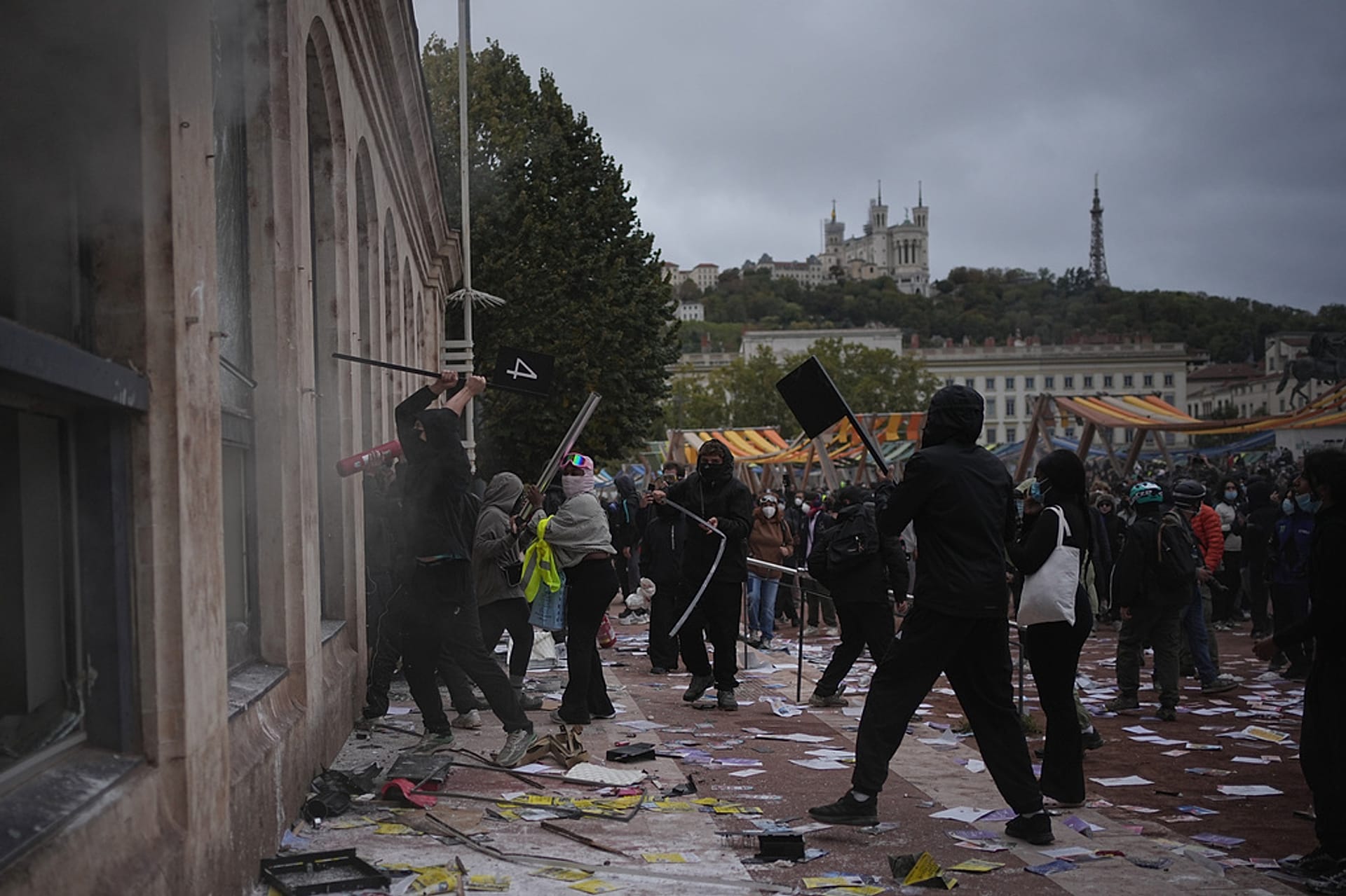 Protesters attack a tourism office during a demonstration against rising living costs, joining students' grievances, in Lyon, France, Saturday, Oct. 17, 2026