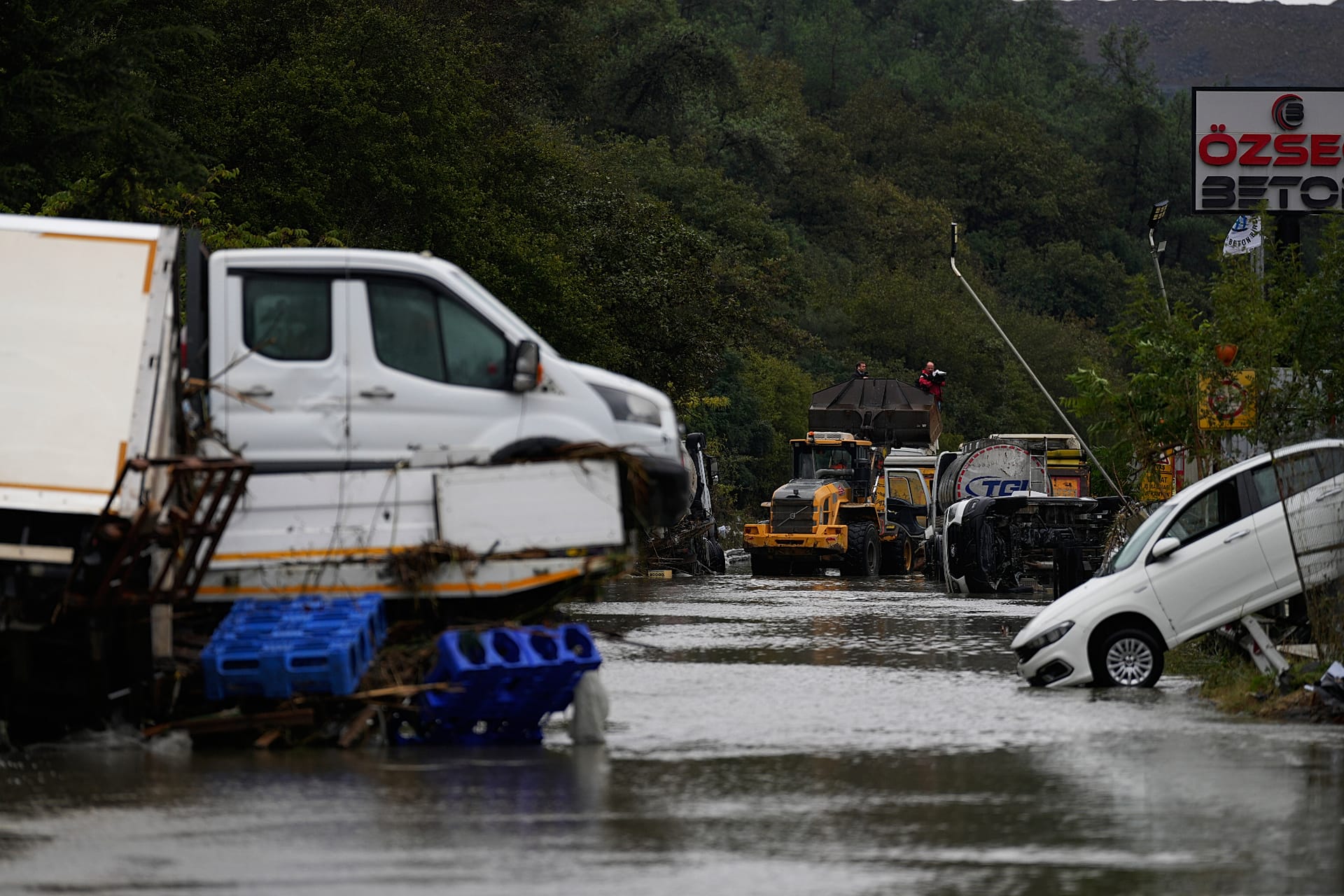 Vehicles lie scattered in the aftermath of floods caused by heavy rains in Istanbul, 15 October, 2026
