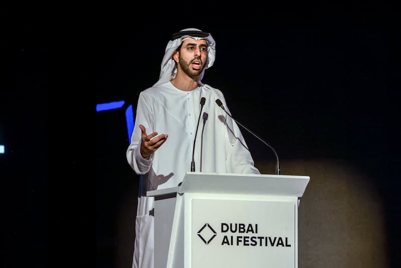 Omar Al Olama, Minister of State for AI, Digital Economy and Remote Work Applications addresses the Dubai AI Festival. Victor Besa / The National