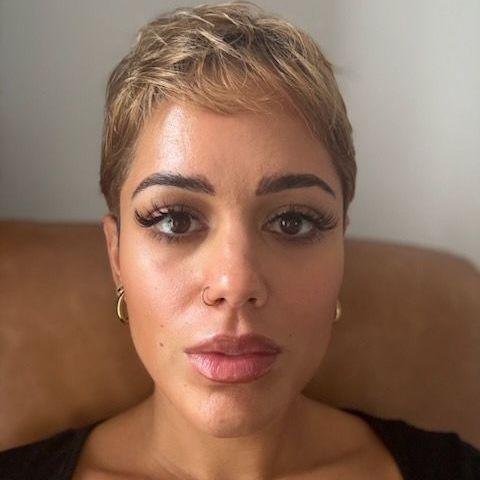 Malin Andersson, who has short cropped blonde hair and wears make up, is seen in a selfie picture 