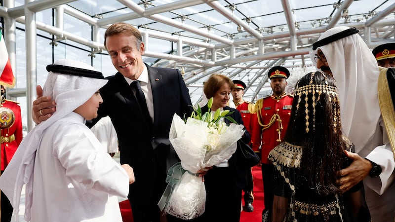Sheikh Meshal, Emir of Kuwait, welcomes Mr Macron at Kuwait International Airport. Reuters