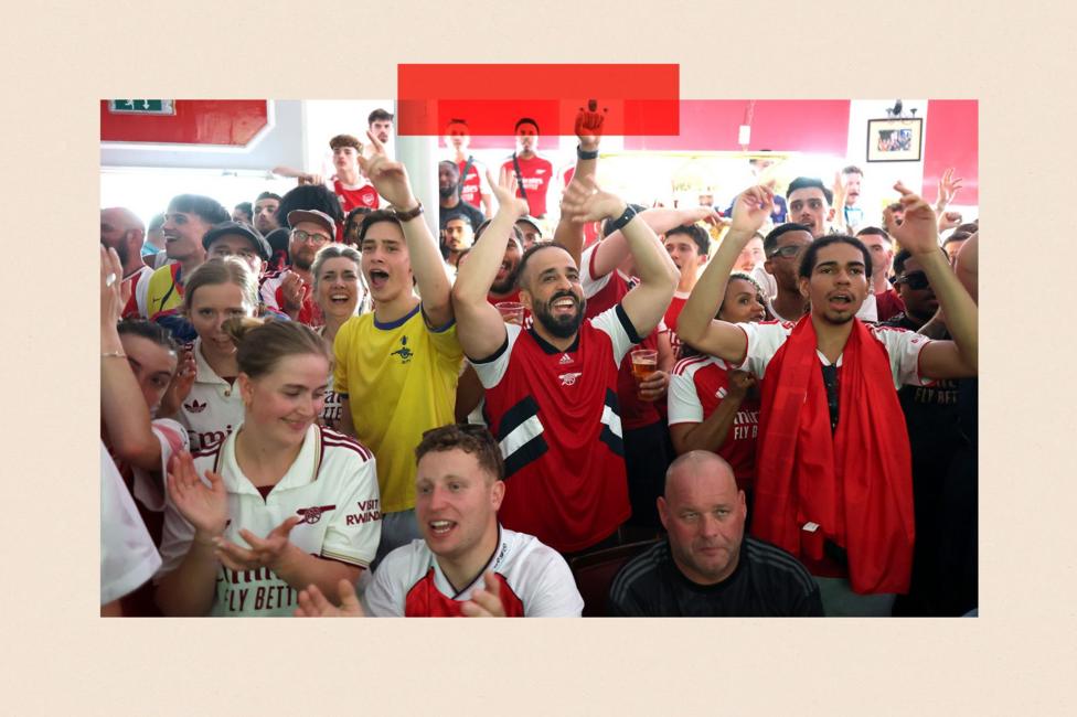 Arsenal fans watch match in the Corner Flag pub during the UEFA Champions League Final between PSG and Arsenal on May 30, 2026 in London, England. 