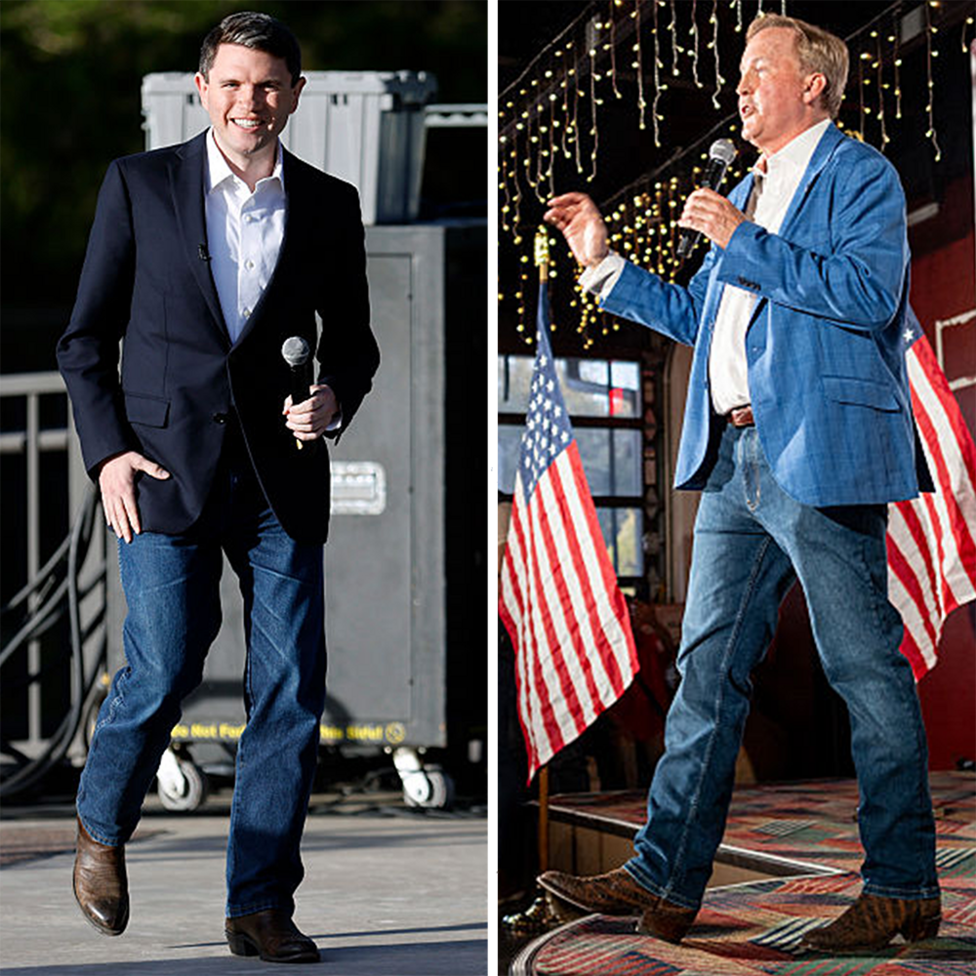 Side-by-side images of James Talarico and Ken Paxton at campaign events. Talarico wears a dark blazer, white open-collar shirt, jeans and brown boots while holding a microphone. Paxton wears a light blue blazer, white shirt, jeans and brown boots while speaking into a microphone, with US flags visible in the background.