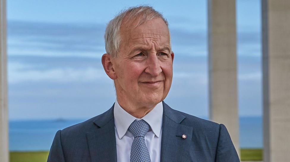 Lord Ricketts pictured at a war memorial