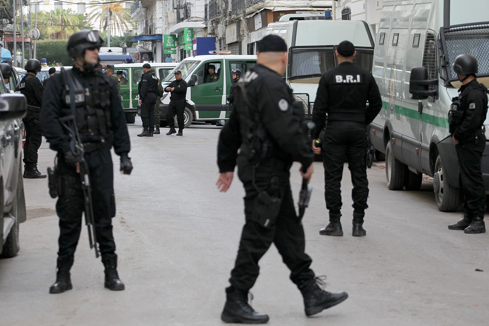 Algerian security officers guard a courtroom in Algiers, 4 December 2019.