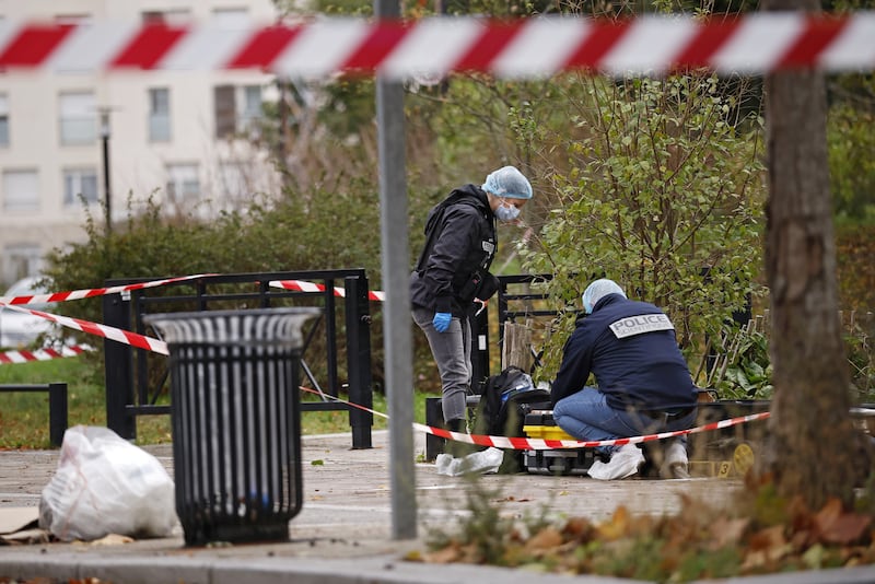 Police at the scene of the shooting in Trappes. EPA