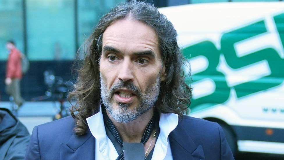 Russell Brand arriving at Southwark Crown Court, London, where he faces three charges of rape, indecent assault, and three counts of sexual assault, relating to six women. Picture date: Wednesday October 28, 2026