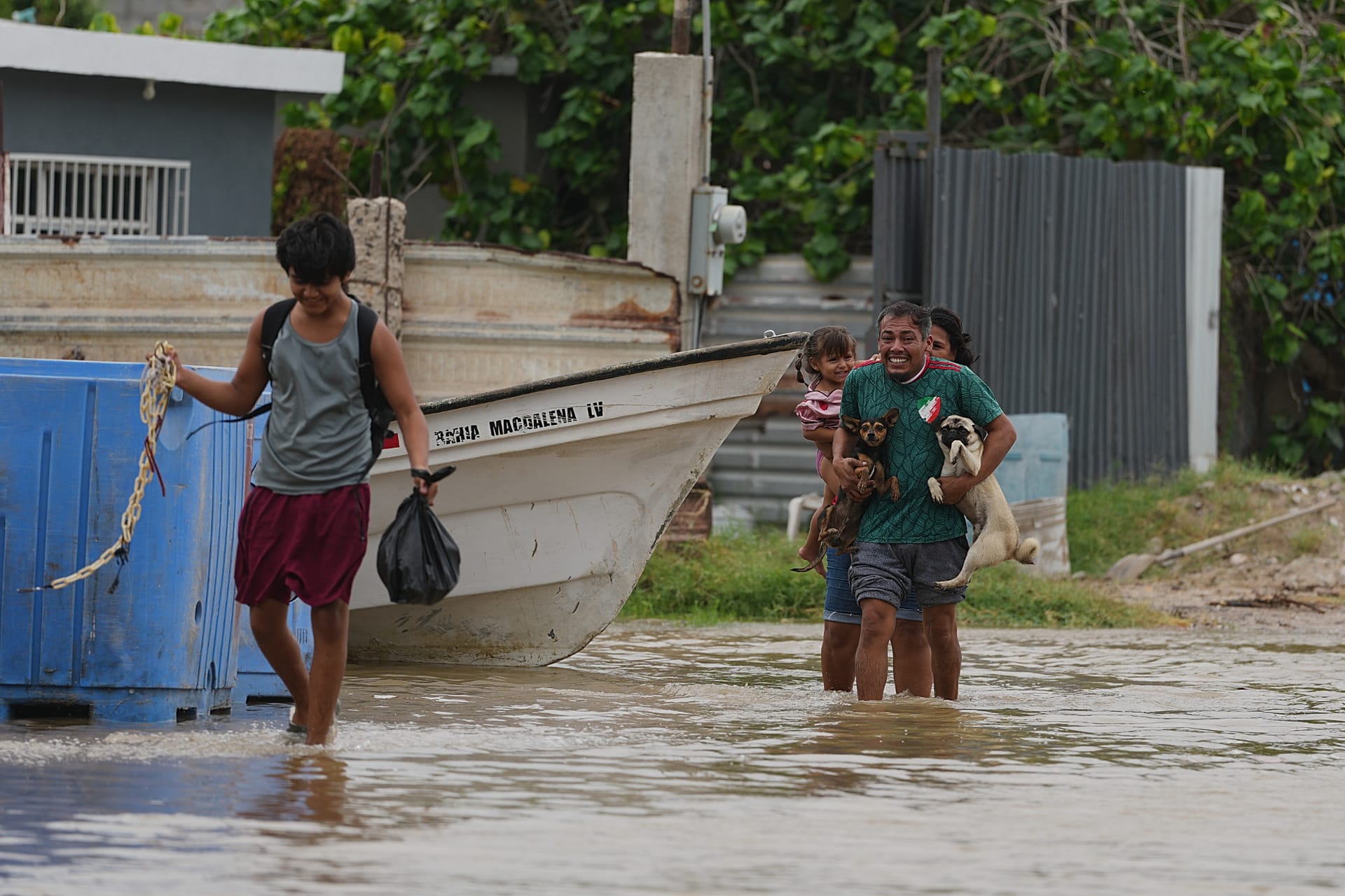 People evacuate their homes as Hurricane Polo approaches Puerto San Carlos, Baja California Sur state, Mexico, Monday, Sept. 28, 2026. 