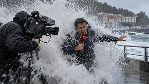 Giant wave engulfs reporter live on air in Spain