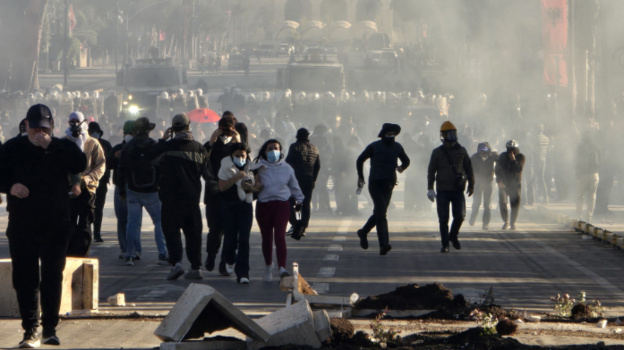 Protesters running from police in Tirana 