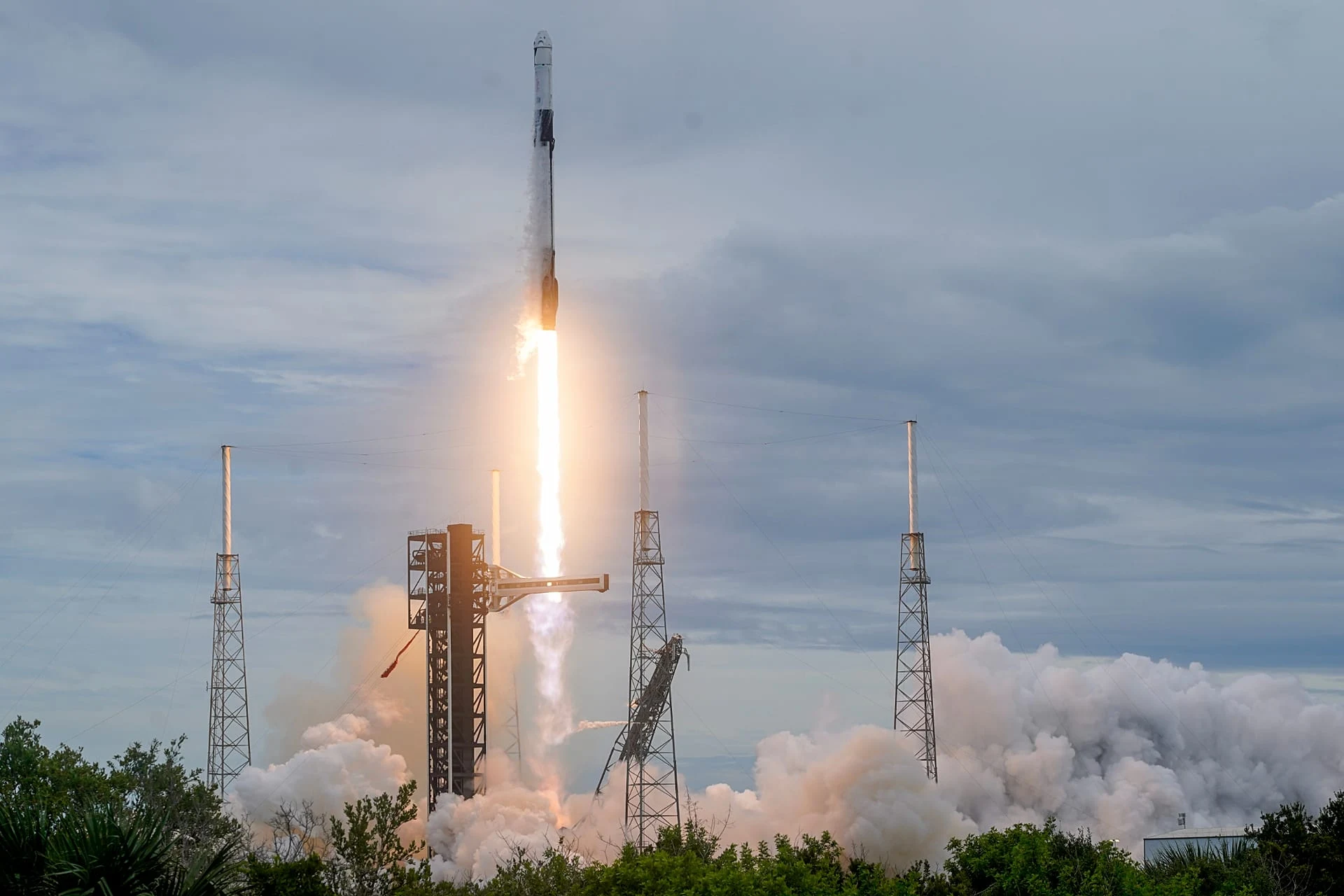FILE. A SpaceX Falcon 9 rocket with a crew of four launches from pad 40 at the Cape Canaveral Space Force Station in Cape Canaveral, Florida, 1 Oct. 2026