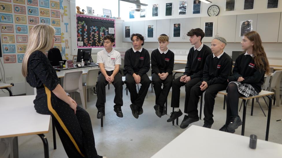 Several pupils in uniform at Yavneh College speak to Judith Moritz about their security concerns