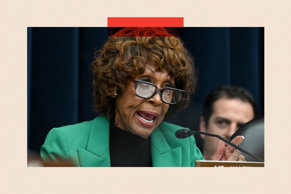 Maxine Waters wearing thick black glasses, a black top and a bright green jacket