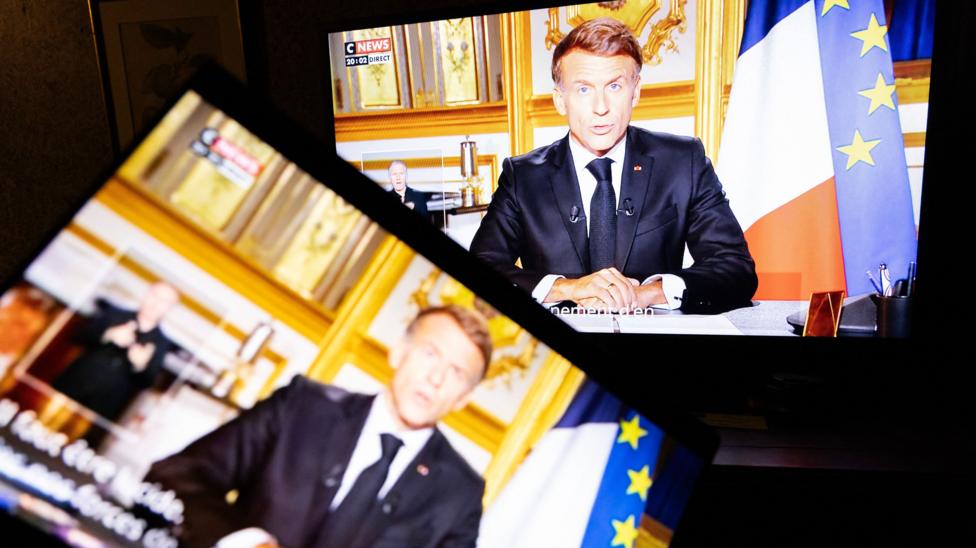 Address by the President of the French Republic Emmanuel Macron on a television screen and a laptop in a home the day after the violence committed at the national demonstration of October 17th throughout France