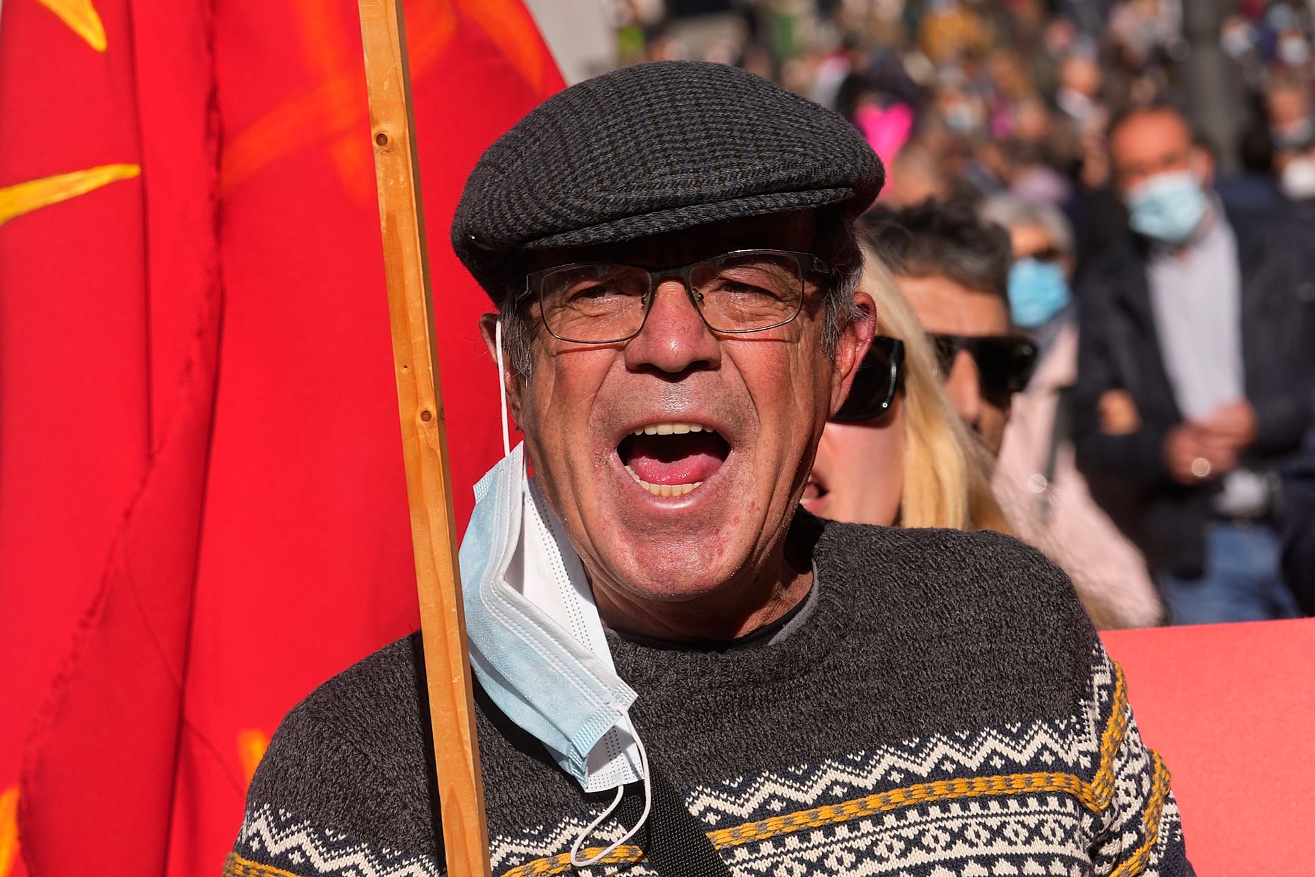 A demonstrator shouts during a rally to defend pensions in Madrid, on Saturday 13 November 2021.