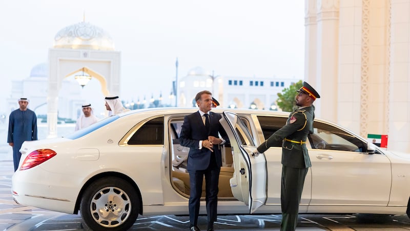 Sheikh Mohamed and Mr Macron arrive for the reception. UAE Presidential Court