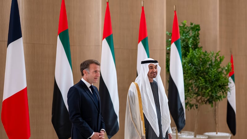 Sheikh Mohamed receives Mr Macron on arrival. UAE Presidential Court